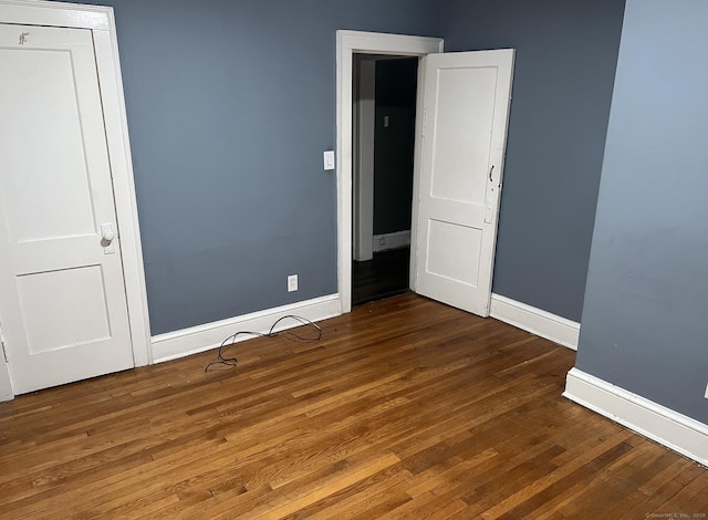 84 Love Ln, Hartford, CT 06112 - spare room with baseboards and wood finished floors