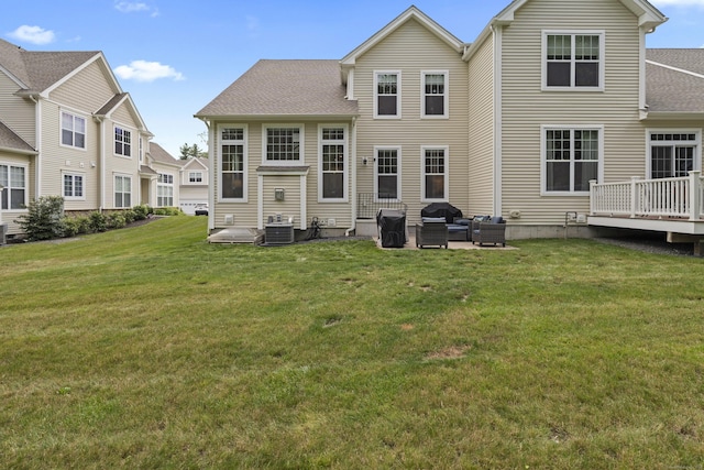 181 Ridgewood Dr Unit 181, Middlebury, CT 06762 - rear view of house featuring a lawn, a deck, an outdoor living space, and a patio