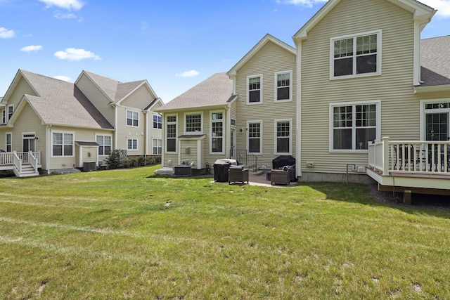 181 Ridgewood Dr Unit 181, Middlebury, CT 06762 - back of house with outdoor lounge area, a wooden deck, a yard, and roof with shingles