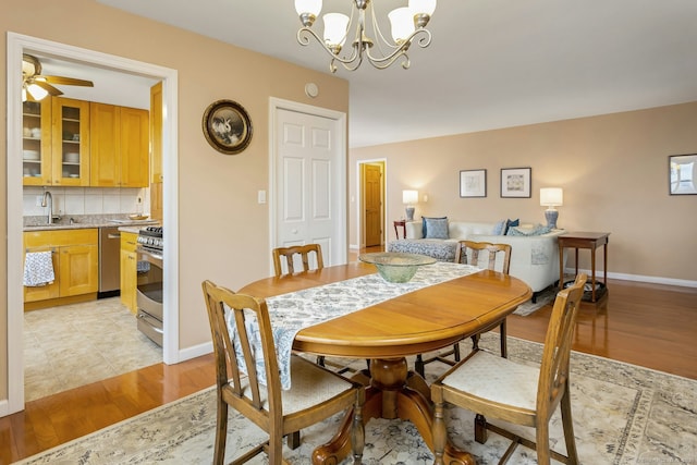 50 Glenbrook Rd Apt 7C, Stamford, CT 06902 - dining room featuring light wood-type flooring, a chandelier, and ceiling fan