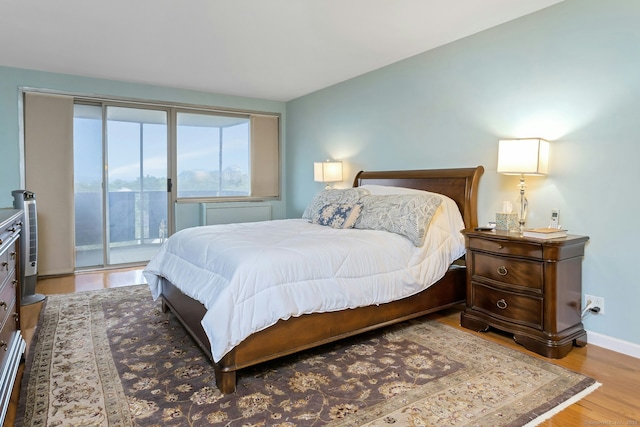 50 Glenbrook Rd Apt 7C, Stamford, CT 06902 - bedroom with access to exterior and wood finished floors