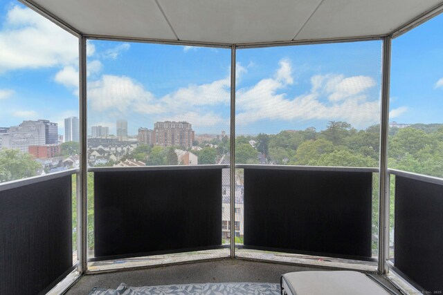 50 Glenbrook Rd Apt 7C, Stamford, CT 06902 - unfurnished sunroom featuring healthy amount of natural light and a city view