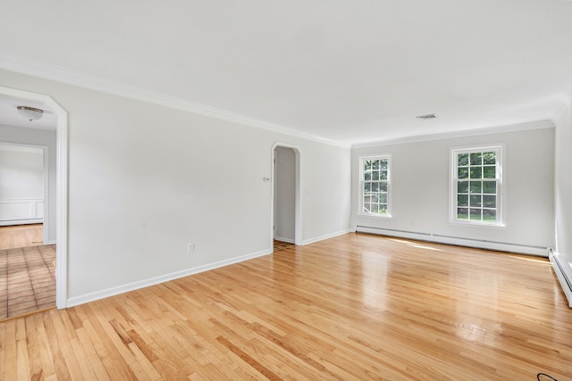 90 Chamberlain Dr, Shelton, CT 06484 - spare room with arched walkways, ornamental molding, light wood-style floors, and baseboard heating