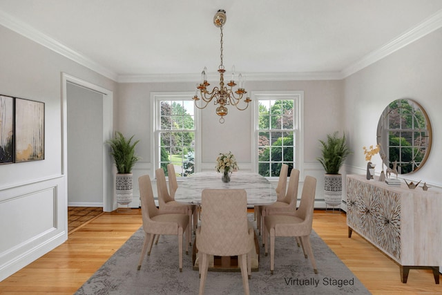 90 Chamberlain Dr, Shelton, CT 06484 - dining room with light wood finished floors, ornamental molding, a chandelier, and a baseboard radiator