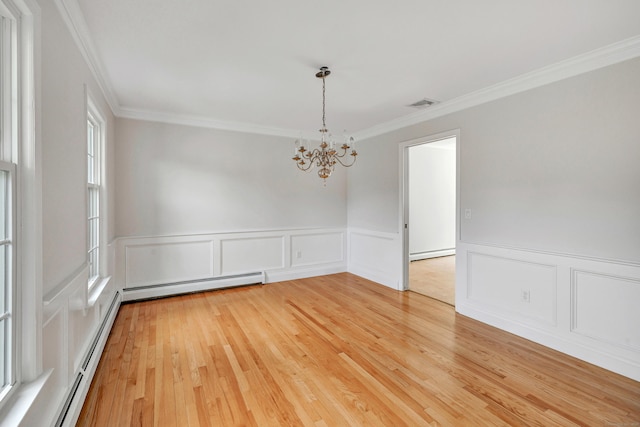90 Chamberlain Dr, Shelton, CT 06484 - unfurnished room with a baseboard heating unit, a baseboard radiator, a chandelier, ornamental molding, and light wood-type flooring