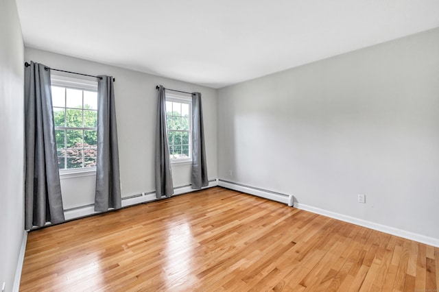 90 Chamberlain Dr, Shelton, CT 06484 - unfurnished room featuring light wood-type flooring and baseboard heating