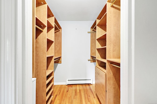 90 Chamberlain Dr, Shelton, CT 06484 - spacious closet featuring a baseboard radiator and light wood-type flooring