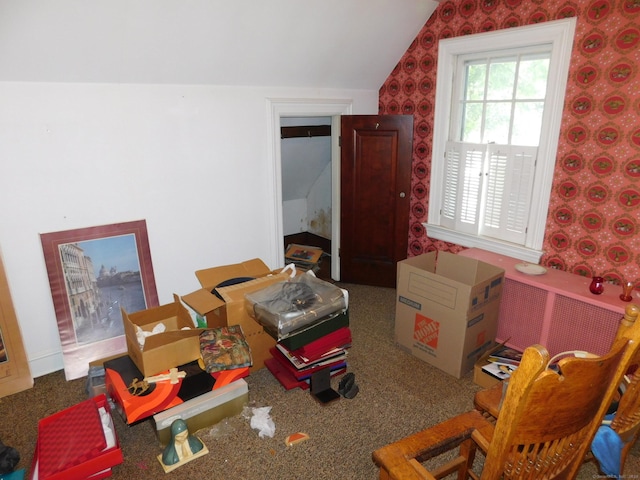 58 Edward St, East Haven, CT 06512 - living area featuring lofted ceiling, wallpapered walls, and carpet floors
