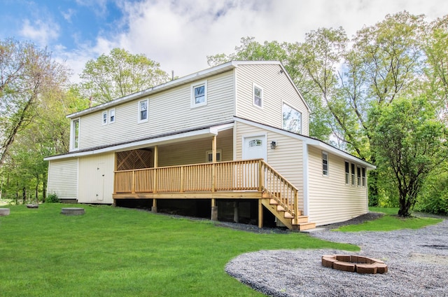 859 Ekonk Hill Rd, Voluntown, CT 06384 - back of house with an outdoor fire pit, a lawn, a wooden deck, and stairway