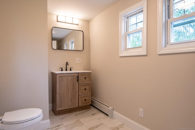 859 Ekonk Hill Rd, Voluntown, CT 06384 - bathroom with a baseboard heating unit, marble look tile flooring, and vanity