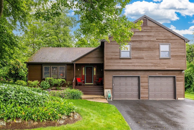 6 Old Sawmill Dr, Beacon Falls, CT 06403 - tri-level home featuring a garage, driveway, a porch, and a front lawn