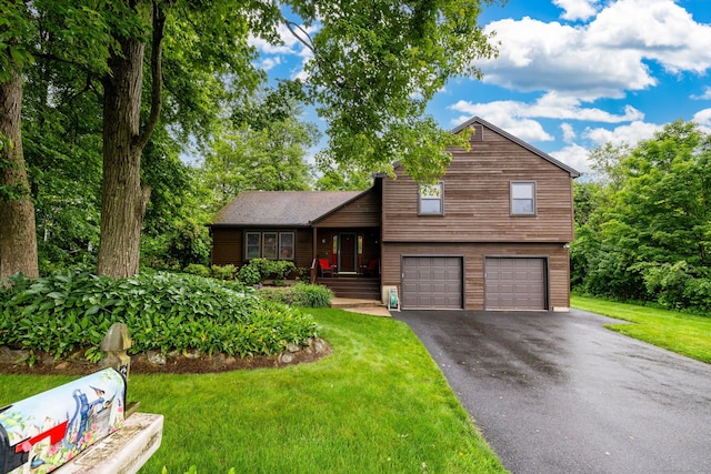 6 Old Sawmill Dr, Beacon Falls, CT 06403 - tri-level home with driveway, an attached garage, and a front yard