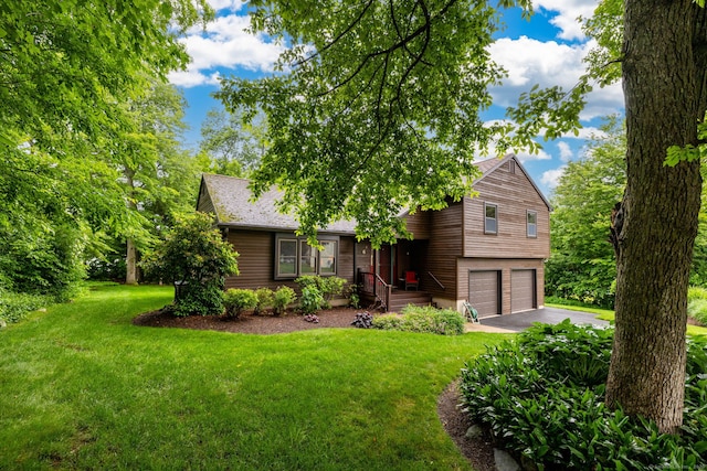 6 Old Sawmill Dr, Beacon Falls, CT 06403 - view of front facade featuring a garage, asphalt driveway, a front lawn, and a shingled roof