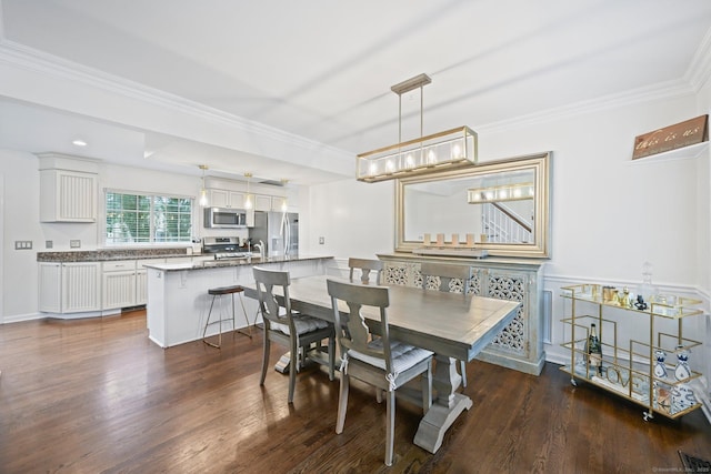 126 Sutton Dr E, Stamford, CT 06906 - dining room with dark wood finished floors, ornamental molding, and a wainscoted wall