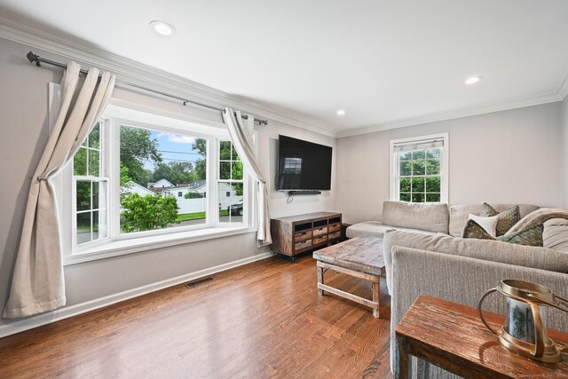 126 Sutton Dr E, Stamford, CT 06906 - living room featuring ornamental molding, wood finished floors, and recessed lighting
