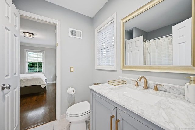 126 Sutton Dr E, Stamford, CT 06906 - full bath with vanity, ensuite bath, and ornamental molding