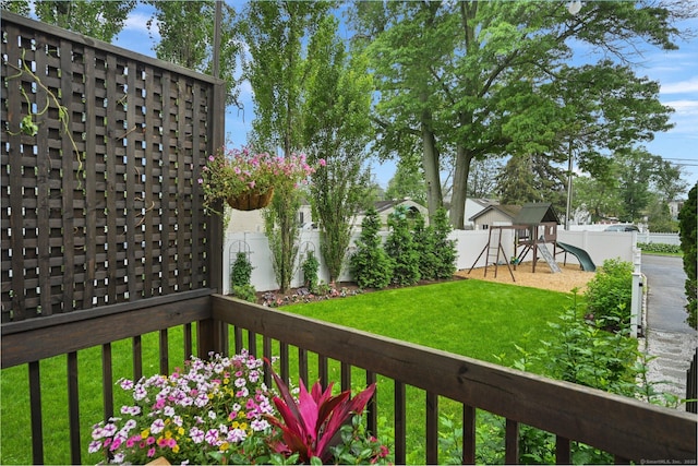 126 Sutton Dr E, Stamford, CT 06906 - deck with a playground and a fenced backyard