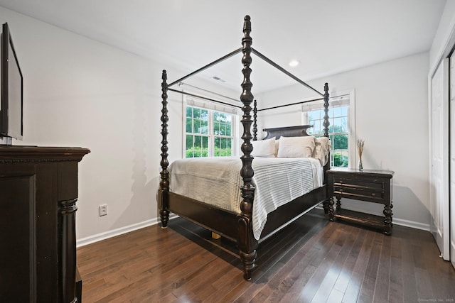 126 Sutton Dr E, Stamford, CT 06906 - bedroom with dark wood finished floors and recessed lighting