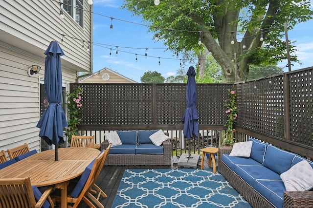 126 Sutton Dr E, Stamford, CT 06906 - wooden deck featuring outdoor lounge area