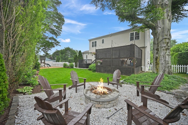 126 Sutton Dr E, Stamford, CT 06906 - view of patio / terrace featuring a fire pit, a wooden deck, and a playground