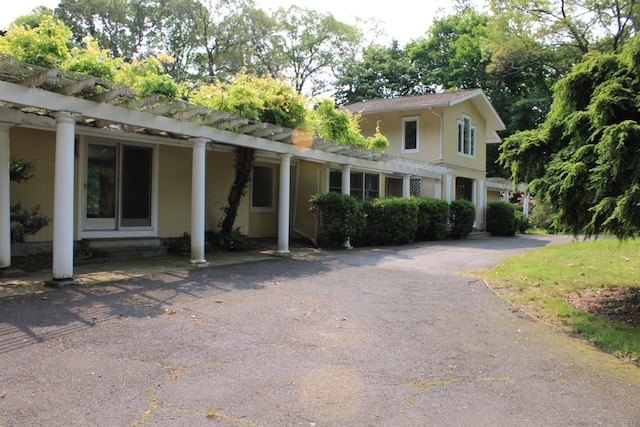 20 Shady Acres Rd, Darien, CT 06820 - view of front facade with stucco siding