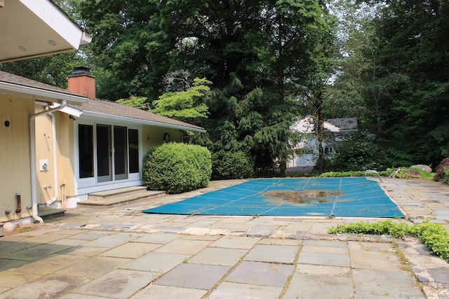 20 Shady Acres Rd, Darien, CT 06820 - view of swimming pool featuring a patio and a covered pool