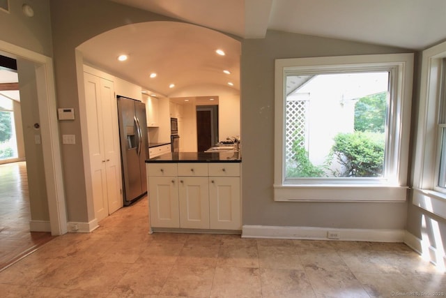 20 Shady Acres Rd, Darien, CT 06820 - kitchen with stainless steel refrigerator with ice dispenser, healthy amount of natural light, white cabinets, dark countertops, and recessed lighting
