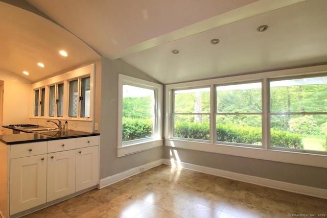 20 Shady Acres Rd, Darien, CT 06820 - kitchen featuring vaulted ceiling, white cabinets, dark countertops, glass insert cabinets, and recessed lighting
