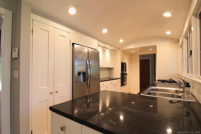 20 Shady Acres Rd, Darien, CT 06820 - kitchen with stainless steel fridge with ice dispenser, recessed lighting, white cabinetry, black microwave, and a peninsula