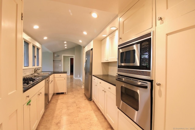 20 Shady Acres Rd, Darien, CT 06820 - kitchen featuring stainless steel appliances, dark countertops, recessed lighting, vaulted ceiling, and tasteful backsplash