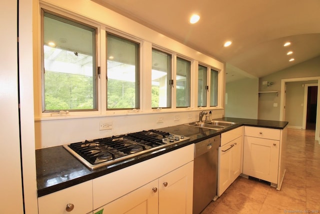 20 Shady Acres Rd, Darien, CT 06820 - kitchen with stainless steel appliances, a peninsula, white cabinets, vaulted ceiling, and recessed lighting