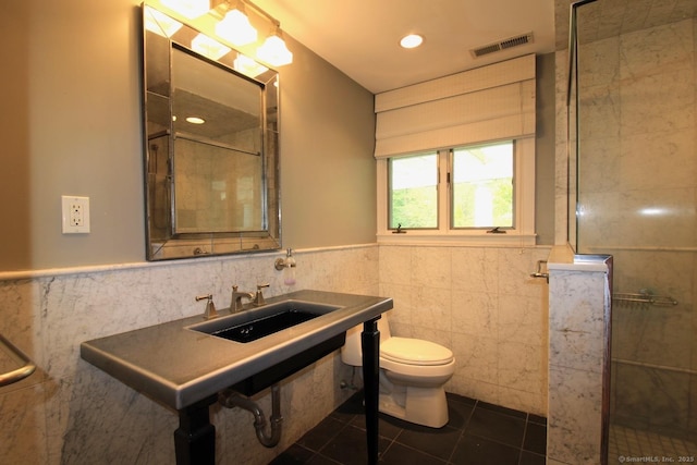 20 Shady Acres Rd, Darien, CT 06820 - full bath with tile walls, tile patterned floors, wainscoting, a shower with shower door, and recessed lighting
