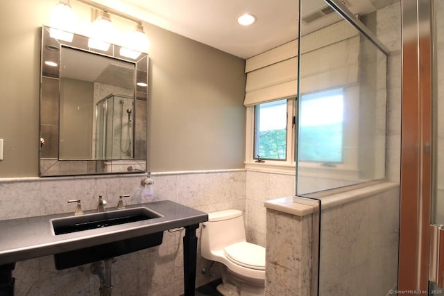 20 Shady Acres Rd, Darien, CT 06820 - bathroom featuring a shower with shower door, tile walls, and a wainscoted wall
