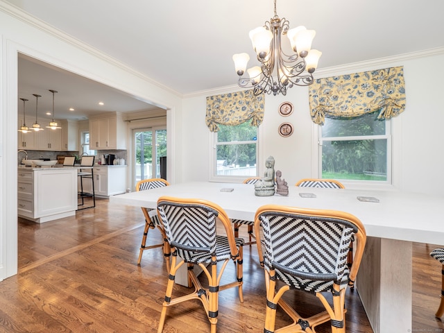 565 Danbury Rd, Wilton, CT 06897 - dining area featuring crown molding, a chandelier, and light wood-type flooring
