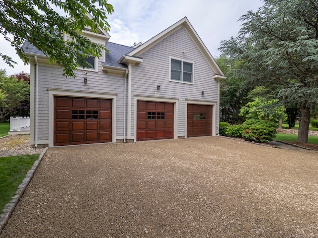 565 Danbury Rd, Wilton, CT 06897 - view of property exterior featuring a shingled roof
