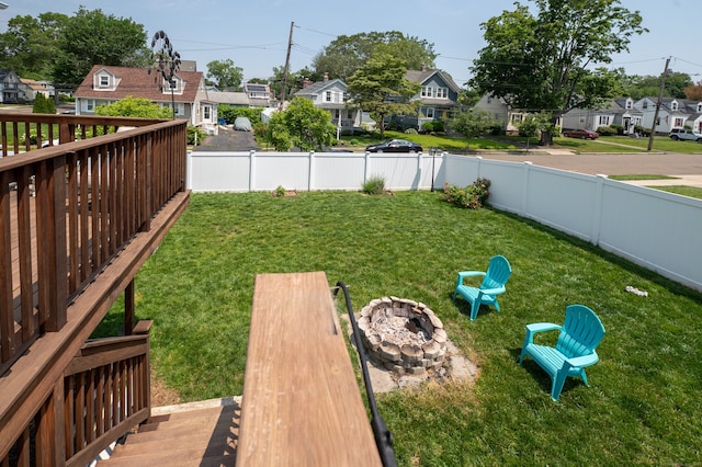 5 Pope St, New Haven, CT 06512 - fenced backyard featuring a residential view and an outdoor fire pit