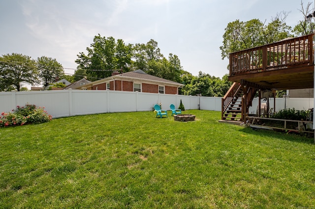 5 Pope St, New Haven, CT 06512 - fenced backyard featuring a fire pit, stairs, and a wooden deck