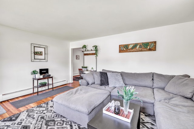 23 Laurel Wood Dr, Shelton, CT 06484 - living room featuring baseboard heating and wood finished floors