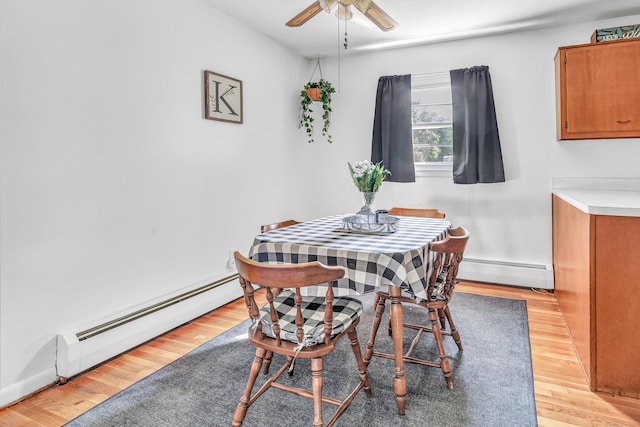 23 Laurel Wood Dr, Shelton, CT 06484 - dining room featuring baseboard heating, ceiling fan, and light wood-type flooring