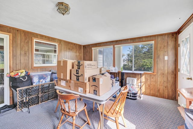 23 Laurel Wood Dr, Shelton, CT 06484 - carpeted dining area featuring wood walls