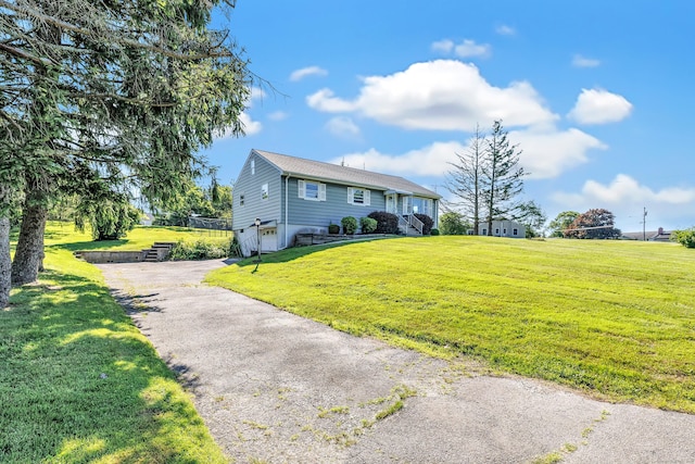23 Laurel Wood Dr, Shelton, CT 06484 - view of front of home featuring asphalt driveway, a garage, and a front lawn