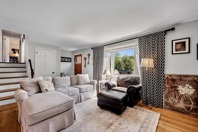 35 Twelve Acre Ln, Glastonbury, CT 06033 - living area featuring wood finished floors and stairs