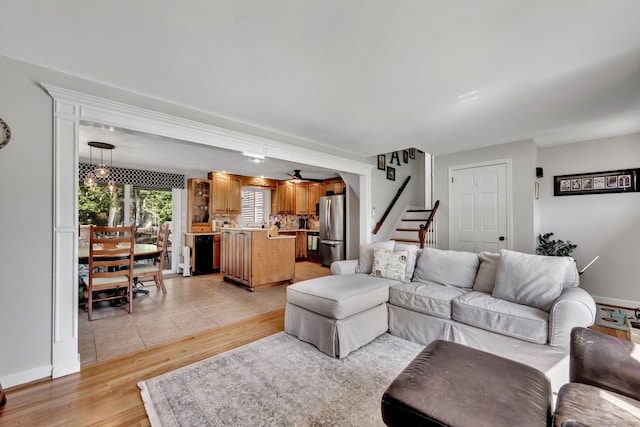 35 Twelve Acre Ln, Glastonbury, CT 06033 - living room featuring stairs, light wood-type flooring, and ceiling fan