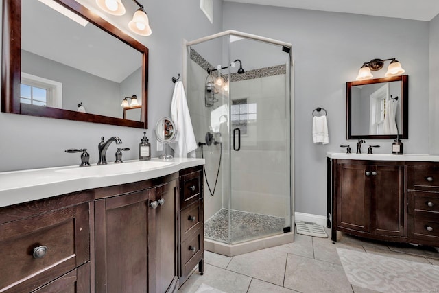 35 Twelve Acre Ln, Glastonbury, CT 06033 - full bathroom featuring a stall shower, two vanities, and tile patterned floors