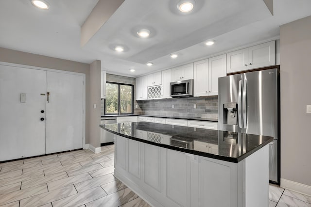 16 Pine Ct Unit 16, Cromwell, CT 06416 - kitchen featuring appliances with stainless steel finishes, white cabinets, backsplash, recessed lighting, and a raised ceiling