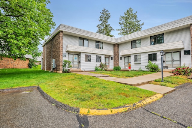 16 Pine Ct Unit 16, Cromwell, CT 06416 - view of property featuring a front lawn and entry steps