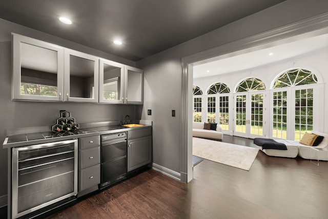 34 Edgewood Dr, Greenwich, CT 06831 - indoor wet bar featuring wine cooler, dark wood-style flooring, recessed lighting, and dishwashing machine