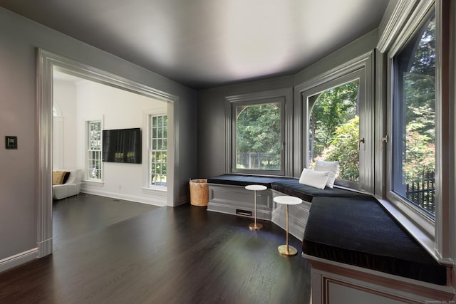34 Edgewood Dr, Greenwich, CT 06831 - living area featuring wood finished floors and healthy amount of natural light