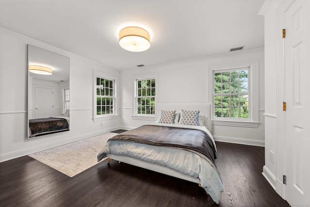 34 Edgewood Dr, Greenwich, CT 06831 - bedroom with crown molding, wood finished floors, and multiple windows
