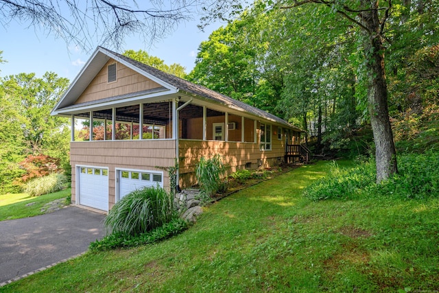 24 Warwick Rd, New Fairfield, CT 06812 - view of front facade with asphalt driveway, a garage, and a front yard